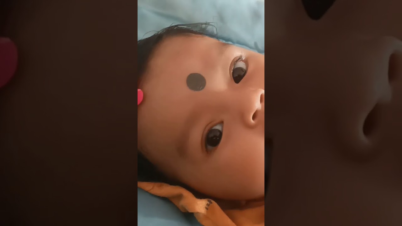 newborn baby video | facing camera closeup