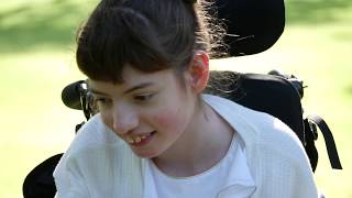 Alessia has quadriplegic cerebral palsy and Ebony the excellent Assistance Dog