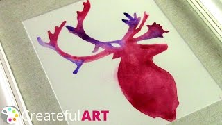 How To Paint a Reindeer -- with Watercolors Learn how to paint a Reindeer Silhouette with Watercolors, a beautiful painting for Christmas. Artist Ashley Krieger teaches you, step