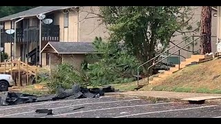 Extensive storm damage in Longview: Fire officials rescue man after tree falls on his truck