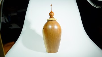 Woodturning   an elm urn with redgum finial #woodturning #urn #hollowform