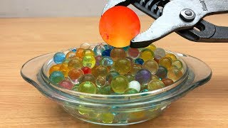 EXPERIMENT Glowing 1000 degree METAL BALL vs Orbeez Satisfying