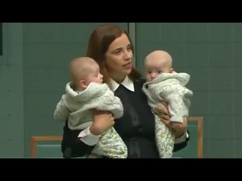 Australian holds twins while giving speech in parliament