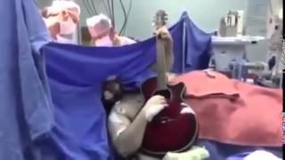 Man Plays Beatles Songs On Guitar During Brain Surgery RAW VIDEO