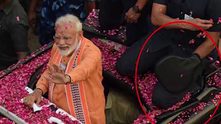 यह हाथ मे क्या पहन रखा है मोदी की रैली में देखो वीडियो डिलीट होने से पहले