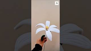 'Glowing Pipe Cleaner Lily with Fairy Lights | Easy DIY Room Decor.' #diydecor  #flowermaking