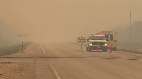 Thousands evacuated in 3 provinces as Canadian wildfires threaten air quality into some US states