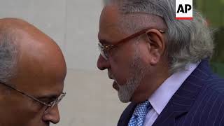 Indian tycoon argues with reporters at UK court hearing