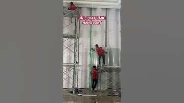 Ốp tường cong lượn sóng với tấm ốp than tre vân đá xám hiện đại