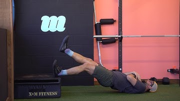 Hamstring Bridge Elevated Single Leg Long Lever | The Movement