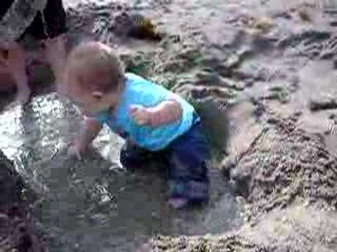 Lily Rosemary splashing at the beach.