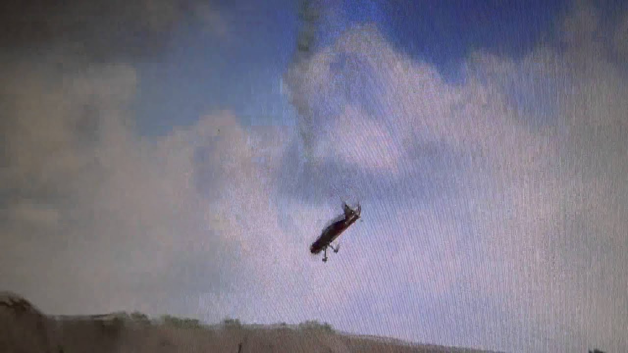 "flat Spin" landing. RC plane lands in flat spin, bounces up and takes