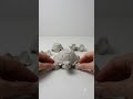 Hands building turtle from egg c…