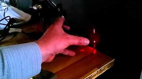 CD and DVD as a diffraction grating for a red laser pointer beam