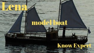 Model electric sailboat with steam engine sound system and smoke machine. Model boat, model ship.