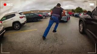 Bodycam: Armed Suspect Runs Into Mall and Jumps to Escape