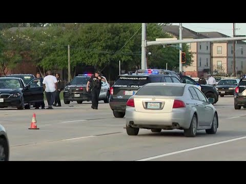 Raw scene video: Boy running across FM 1960 hit by car and killed