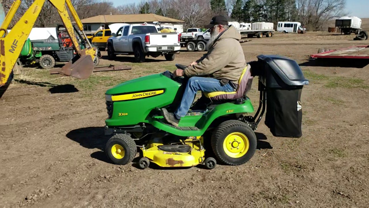 John Deere X324 4 Wheel Steer Riding Lawn Mower With Blower And Bagging