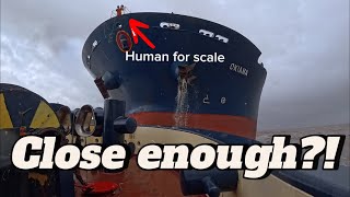 Towing bow-to-bow in the rain, Tugboat and Bulk Carrier meet head on! Ambient sound and pilot comms