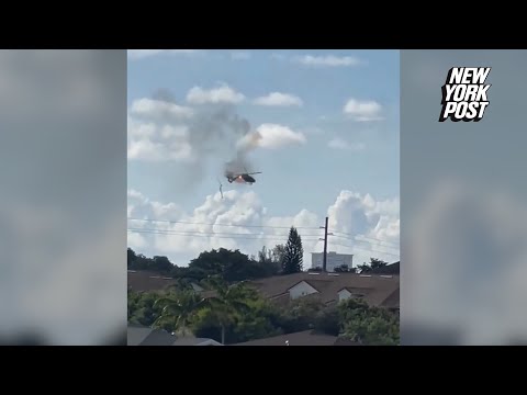 Air-rescue helicopter crashes into Florida apartment building