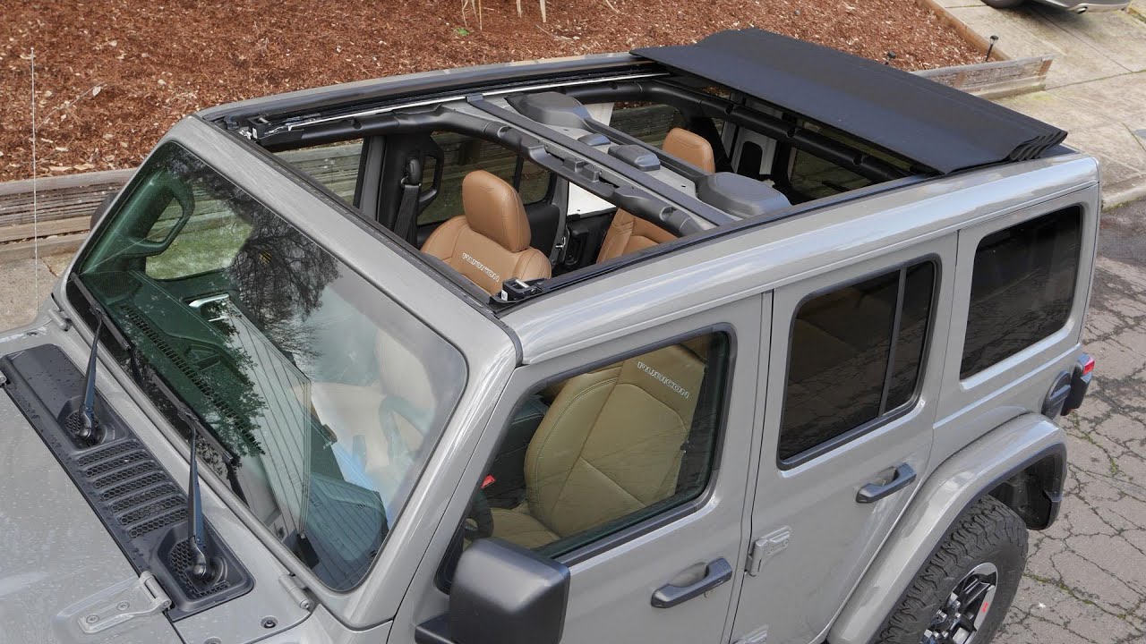 Arriba 93+ imagen jeep wrangler sky one-touch power roof