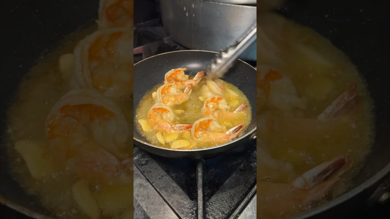 CAMARÃO AO ALHO (Garlic Shrimp) being made at Churraqsqueira Bairrada in Mineola NY! #DEVOURPOWER