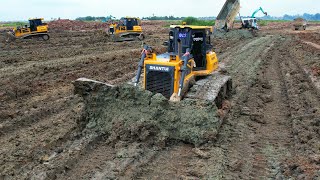 DumpTruck Unloading Soil Stuck Ever And bulldozer shantui push land