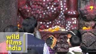 Offering coins to menstruating Indian goddess: Kamakhya Temple