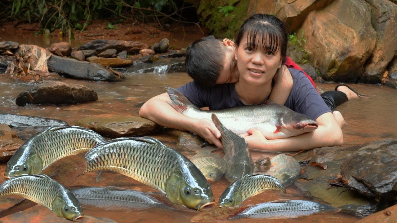 Single Mother and Her Child Catch Giant Fish in the Stream to Sell ...