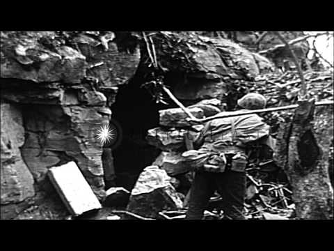 U.S. Marines seek out remaining Japanese defenders in final days of battle for Iw...HD Stock Footage