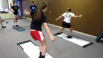 Devin and Kristi Slideboard Lateral Slides.MOV