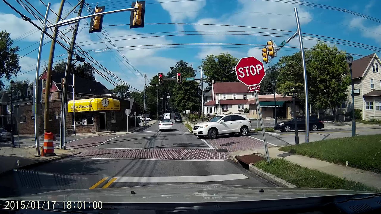 Black Car Runs Stop Sign Bala Ave