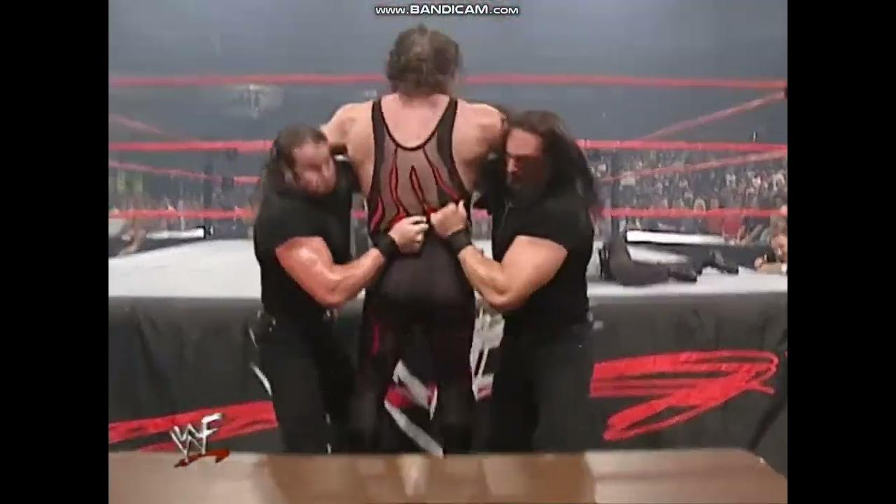 Kronik double chokeslam Kane through table YouTube