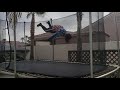 AJ Mallas doing flips on the trampoline
