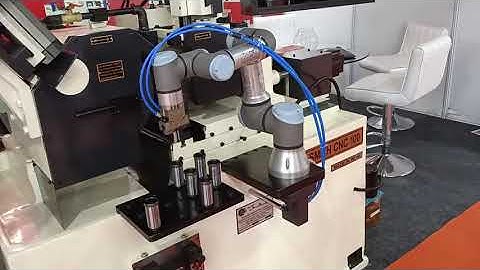 CNC Centerless Grinder with Auto Loading/Unloading. Robotic System for Centerless Grinders.