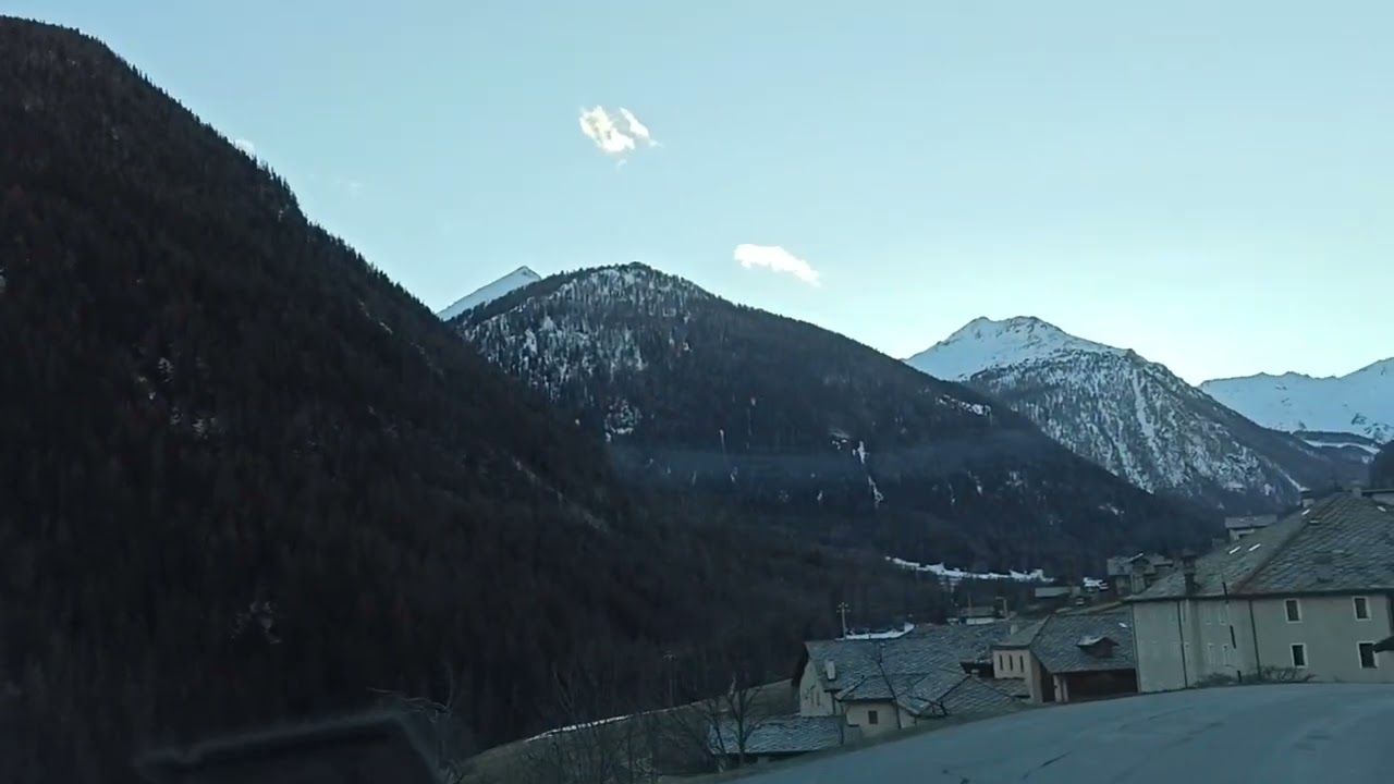 Driving towards Chateau Verdun at dusk, saint Oyen, Aosta valley, Italy, 22/02/22