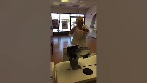 Cynthia Jarrett singing at Metro PCS store.