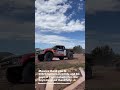 Right place, right time. Chris Polvoorde's team helps overturned Trophy Truck Spec #6187 in pre-run