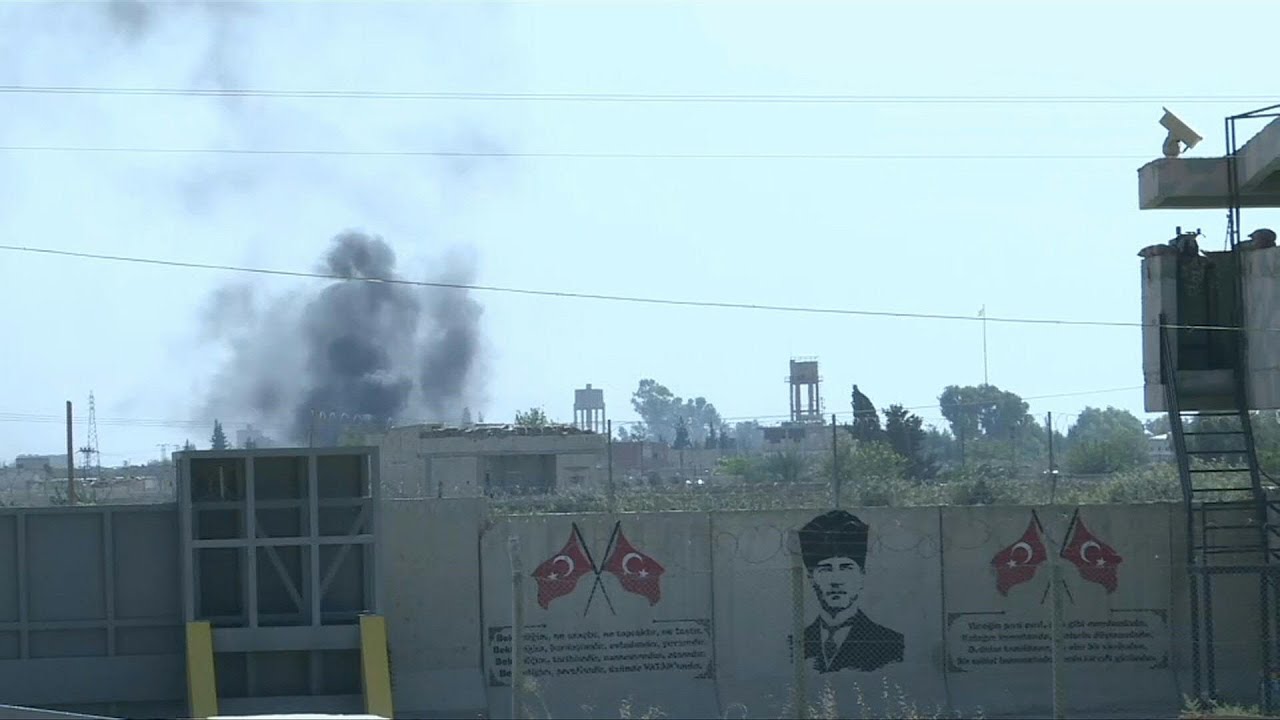 Smoke billows above Syrian border in Kurdish-controlled areas | AFP