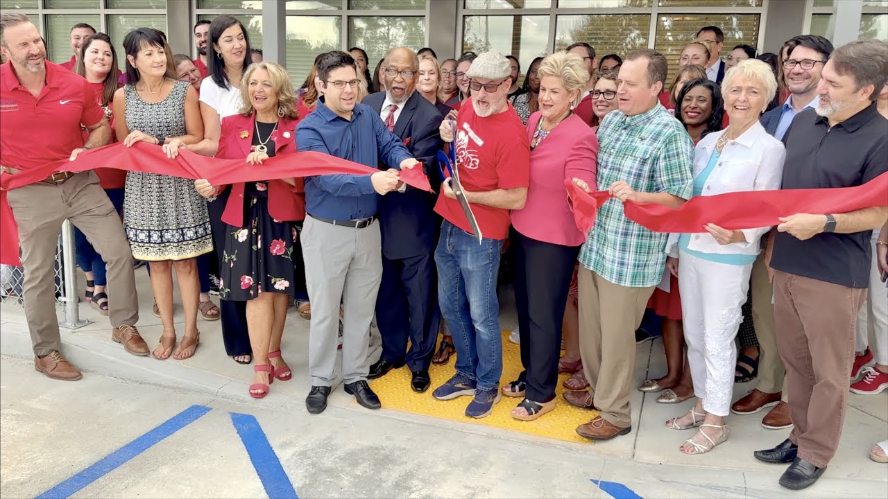 Champ Cooper Ribbon Cutting - YouTube