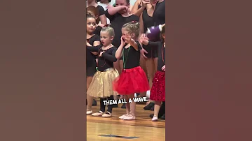 Little Girl Looks For Her Family In The Crowd 