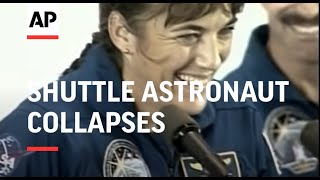 Shuttle astronaut collapses during welcome home ceremony