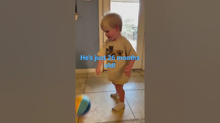 Dribbling 2 yr old baby boy toddler plays basketba...