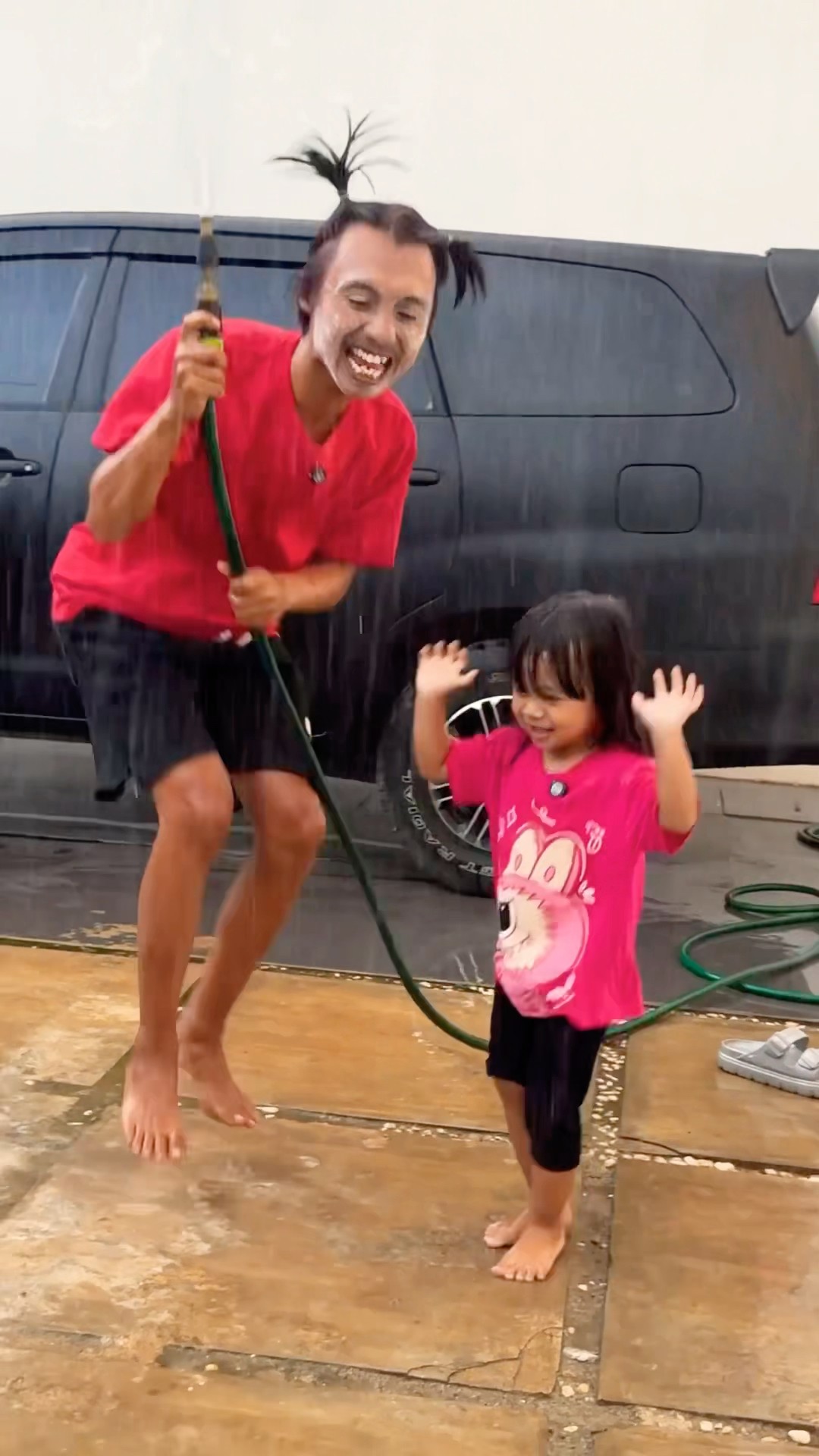 Mandi Hujan Buatan