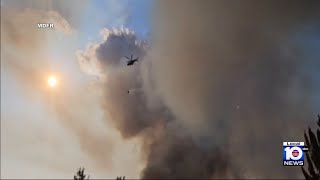 Rescue crews work to contain massive brush fire in southwest Miami-Dade