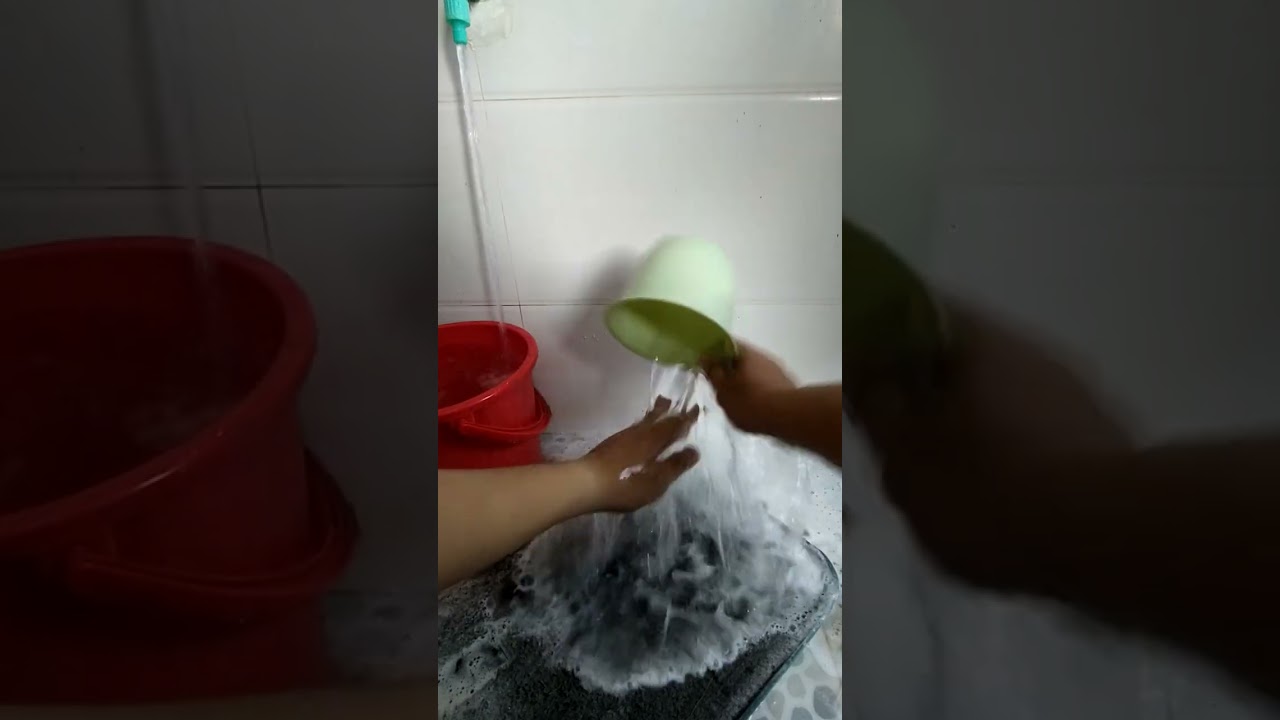 Cleaning a bathroom mat