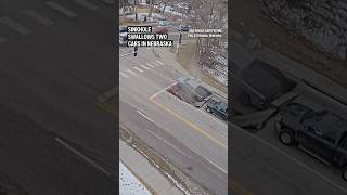 Sinkhole swallows two cars in Nebraska