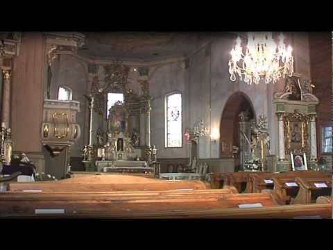 Historię drewnianego kościoła parafialnego  pw. Św. Michała Archanioła w Domachowie