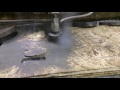 Waterjet cutting 1/8in rubber between plywood Waterjet cutting 1/8in rubber between plywood
