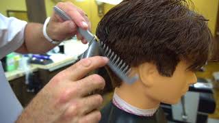 The surface and spine of the Zoot comb by Jack dean for Denman  are designed for haircutting success